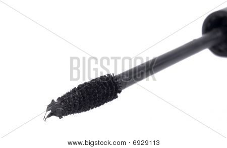 borstar för en mascara på en vit bakgrund