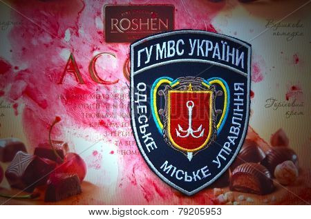 Illustrative editorial. Chevron of Ukrainian Police in Odessa City.With logo Roshen Inc. Trademark Roshen is property of ukrainian president Poroshenko.At December 20,2014 in Kiev, Ukraine