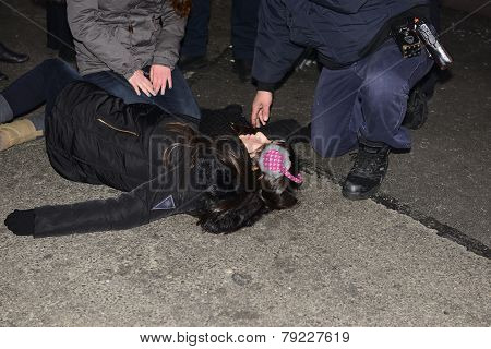 Unconscious reveler being treated