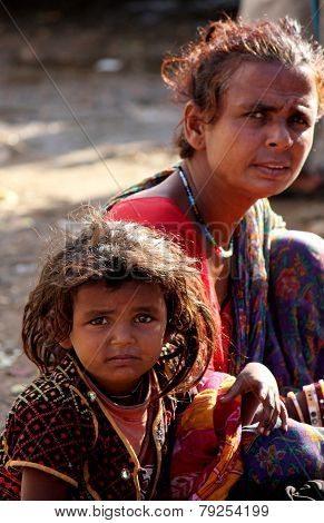 A Poor Indian Mother  With Her Daughter
