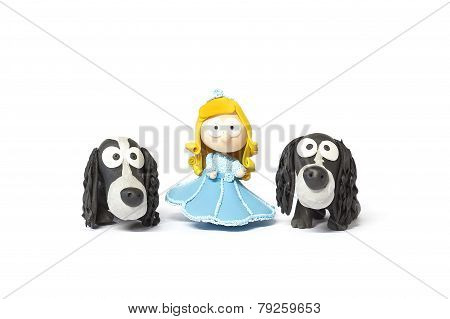 Toy Doll With Dogs On White