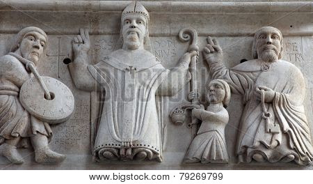 SPLIT, CROATIA - FEBRUARY 19: Saints, portal of the Cathedral of St. Domnius in Split on February 19, 2011.