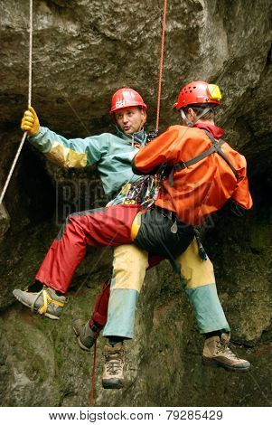 Cavers work out rescue operations in caves.