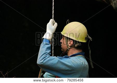 Cavers work out rescue operations in caves.