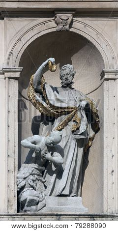 VIENNA, AUSTRIA - OCTOBER 10: Statue of Saint on baroque Jesuits church. The church was built between 1623 and 1627. in Vienna, Austria on October 10, 2014.