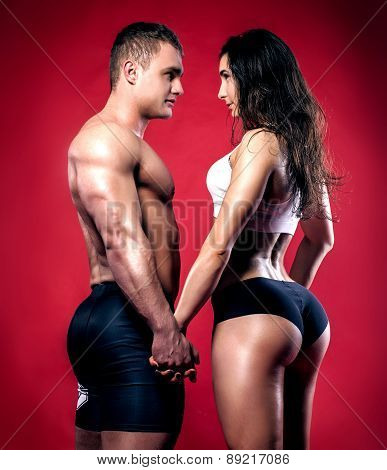 Couple Over Red Background.