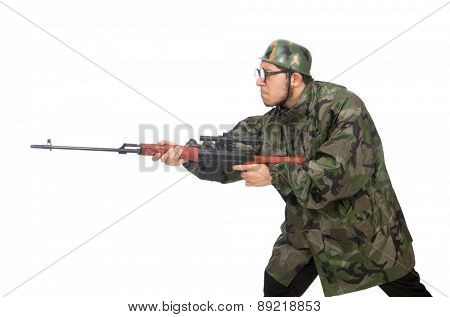 Military man with a gun isolated on white