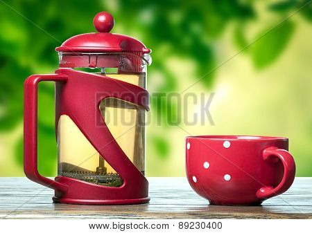 Red Teapot And Cup With Tea