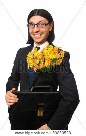 Handsome businessman with flower and brief case isolated on white