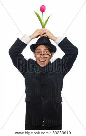 Young man in black costume with flower isolated on white