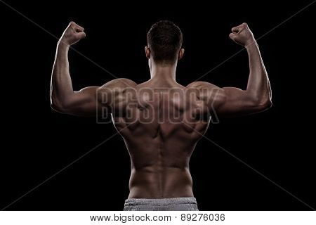 young athlete bodybuilder from back