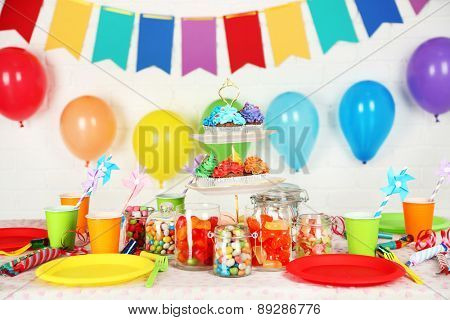 Prepared birthday table with sweets for children party