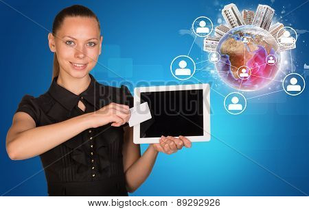 Businesswoman holging tablet and blank card