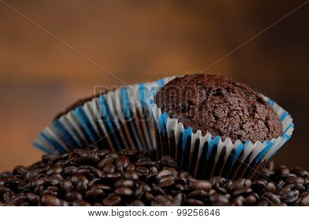 muffins or coffee cake brown background close up