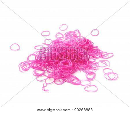 Pile of pink rubber loom bands