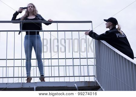 Policewoman Trying To Stop Woman