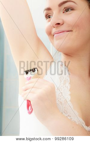 Woman Shaving Armpit With Razor Shaver. Hygiene.