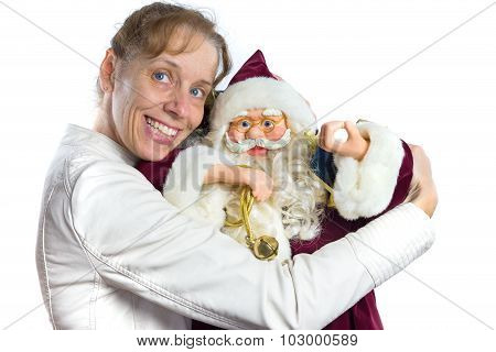 Caucasian woman embracing Santa Claus at christmas
