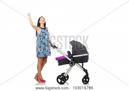 Happy mom with her baby in pram 