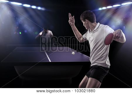 Table tennis player serving