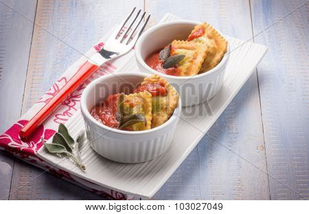 fried ravioli with tomatoes sauce