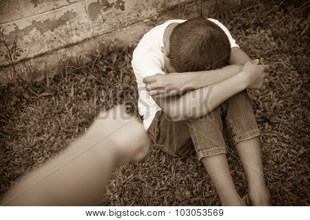 Asian boy scared and alone