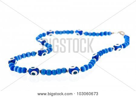 Turkish chainlet with blue eye isolated over white background
