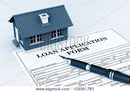 Loan Application Form With House And Pen