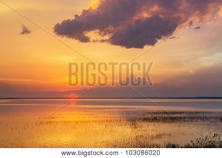 Sunset over water summer evening cloud lake