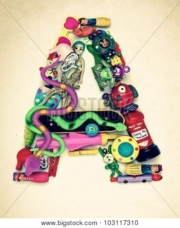 the letter A made from small toys