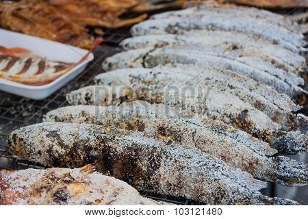 Striped Snakehead Fish Grilled In A Salt Crust In The Market.