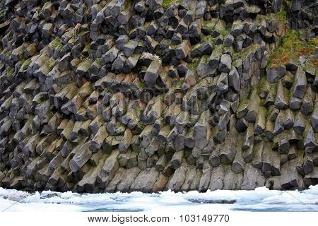 Arctic rocks background - basalt or touchstone formations