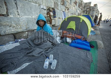 KOS, GREECE - SEP 28, 2015: Unidentified Refugee. Kos island is located just 4 kilometers from the Turkish coast, and many refugees come from Turkey in an inflatable boats.