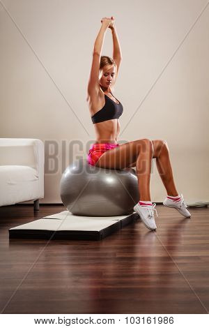 Woman Doing Fitness Exercises With Fit Ball