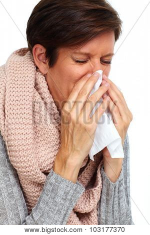 Woman with facial tissue having rheum. Health care.