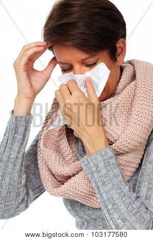 Woman with facial tissue having rheum. Health care.