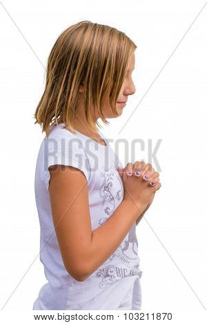 Girl Child Praying Isolated On White Background With Folded Hands, Side View Shot