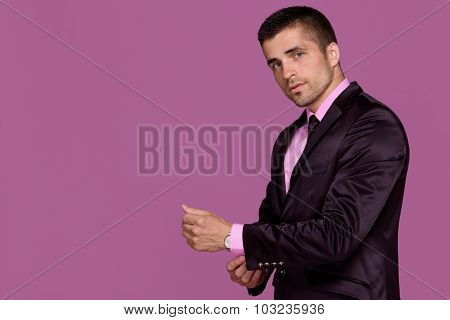 handsome young man wears a watch