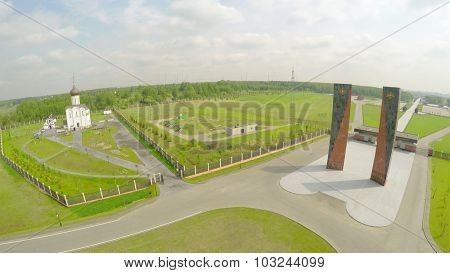 SAMARA - MAY 24, 2015: Monument on Federal Memorial Cemetery at spring cloudy day. Aerial view video frame in timelapse