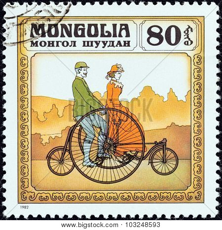 MONGOLIA - CIRCA 1982: A stamp printed in Mongolia shows Coventry Rotary Tandem, 1870s