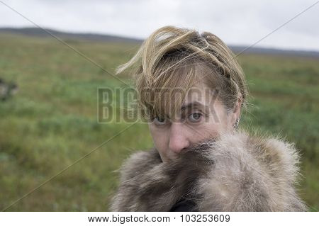 Woman Wrapped Up In Coat