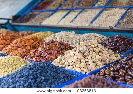 Dry Fruits And Spices Like Cashews, Raisins, Cloves, Anise, Etc. On Display For Sale In A Osh Bazaar