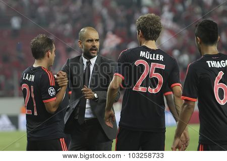 Coach Josep Guardiola Celebrates With The Players Of Bayern Munchen During The Uefa Champions League