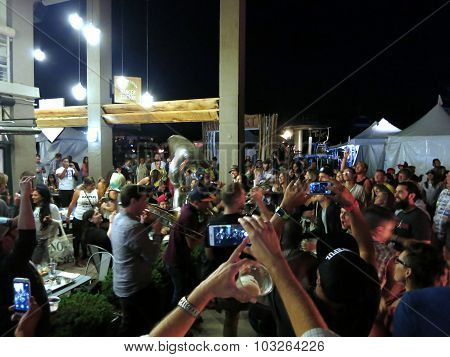 People Watch And Photograph High & Mighty Brass Band Concert