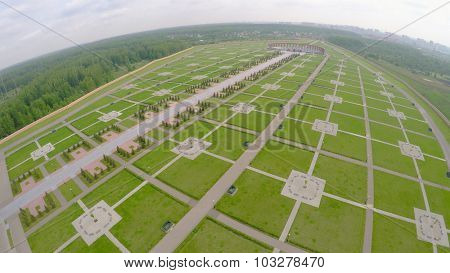 Large territory of Federal Memorial Cemetery at spring cloudy day. Aerial view video frame