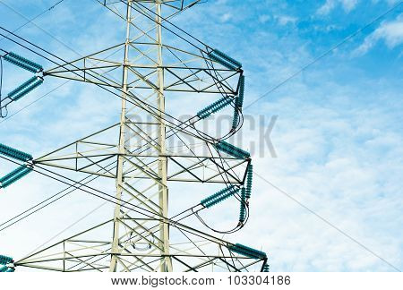 High Voltage Transmission Lines Isolated On Blue Sky Background
