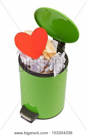 Heart thrown in the trash. The concept of separation, terminatio