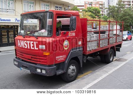 VALENCIA, SPAIN - SEPTEMBER 28, 2015: An Amstel Beer delivery truck parked in the street. Amstel Brewery was a Dutch brewery founded in 1870 in Amsterdam and was bought by Heineken in 1968.