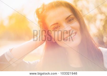 Sunshine Outdoor Portrait Of Smiling Pretty Girl