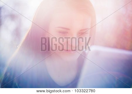 Beautiful Girl With Tablet Or Ebook Outdoor
